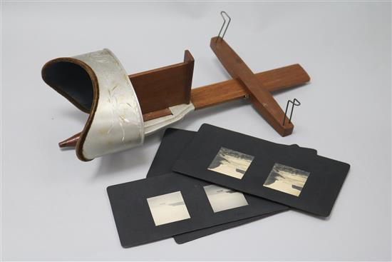 A stereoscope viewer and cards